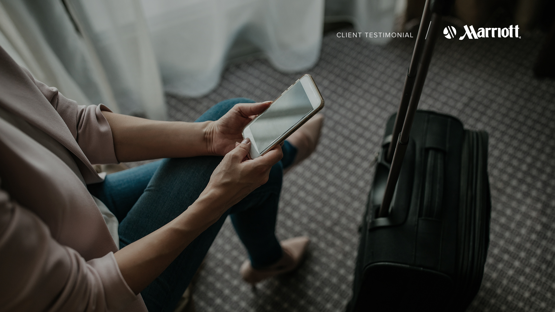 Woman sitting in hotel room