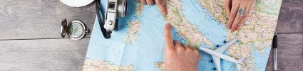 hands pointing to location on map