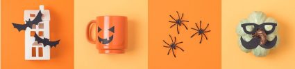 Halloween mug and plastic spiders