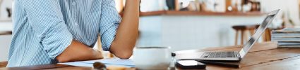 Person sitting on front of computer