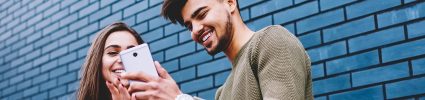 Young man looking at his phone