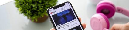 Phone with YouTube video on screen