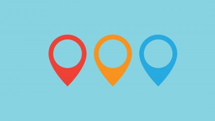 three map icons in red yellow and blue on blue background