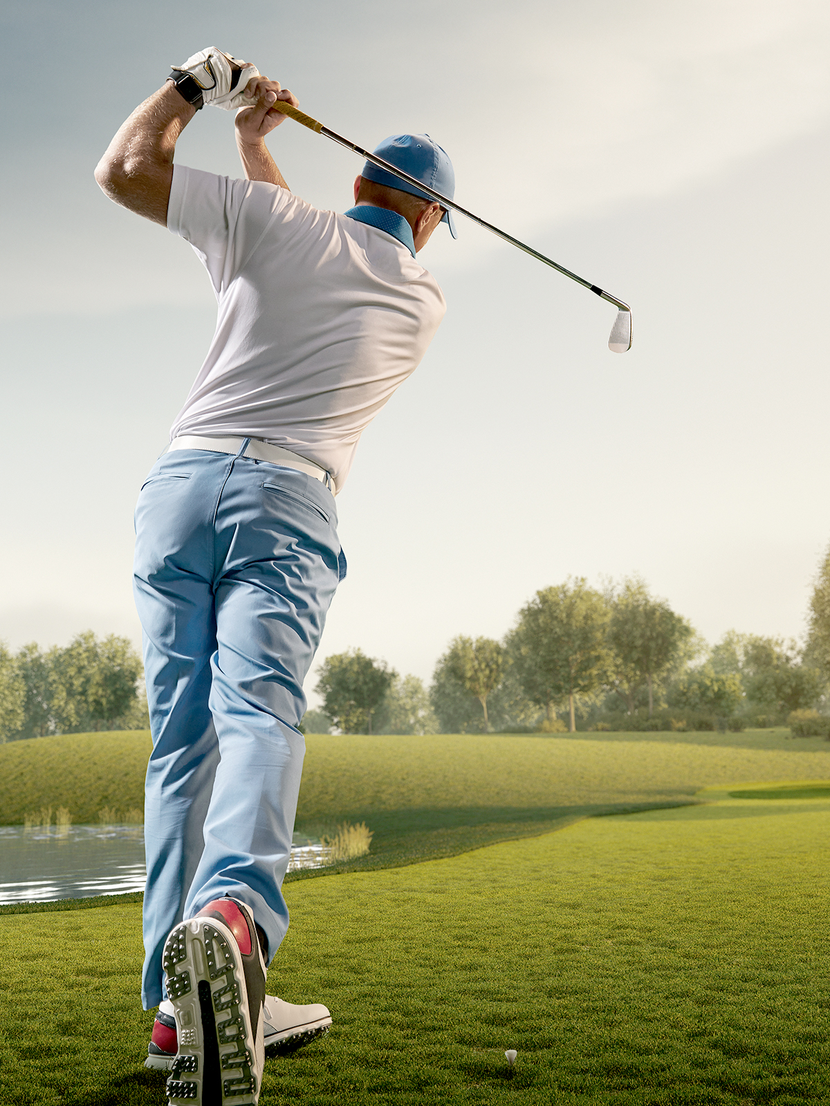 Golfer hitting the ball