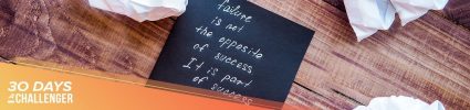 Handwriting on chalk board saying "Failure is not the opposite of success, it is part of success."