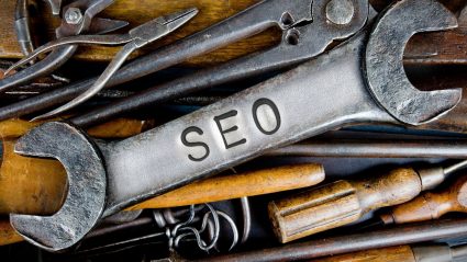 Handyman toolbox with SEO letters on wrench