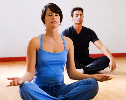 People doing yoga.