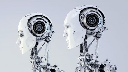 female and male white robots side by side profile view
