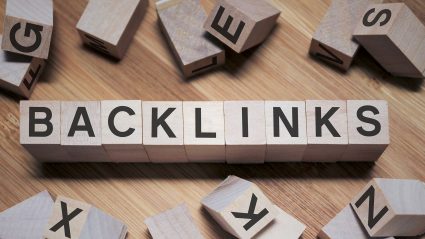 wooden blocks spelling the word backlinks