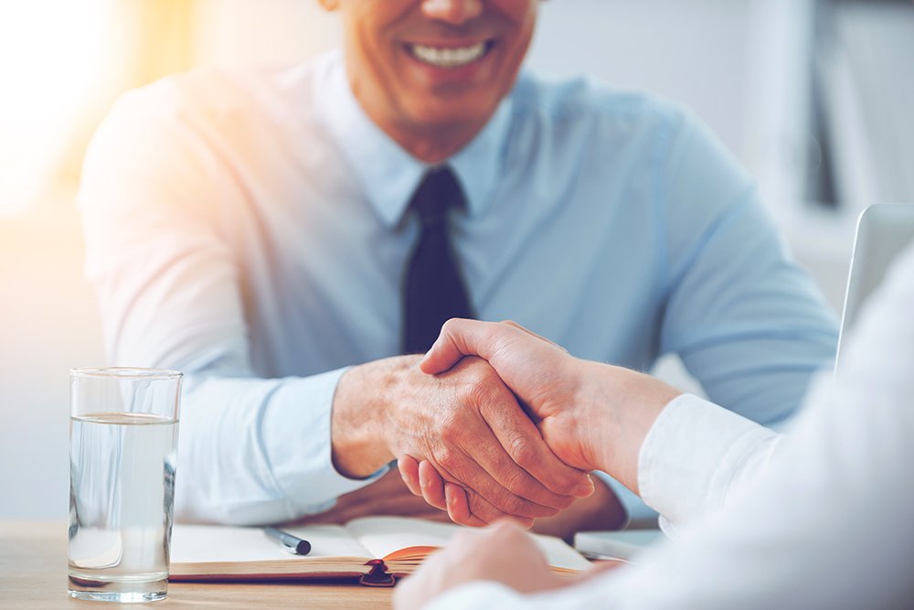 Two people shaking hands