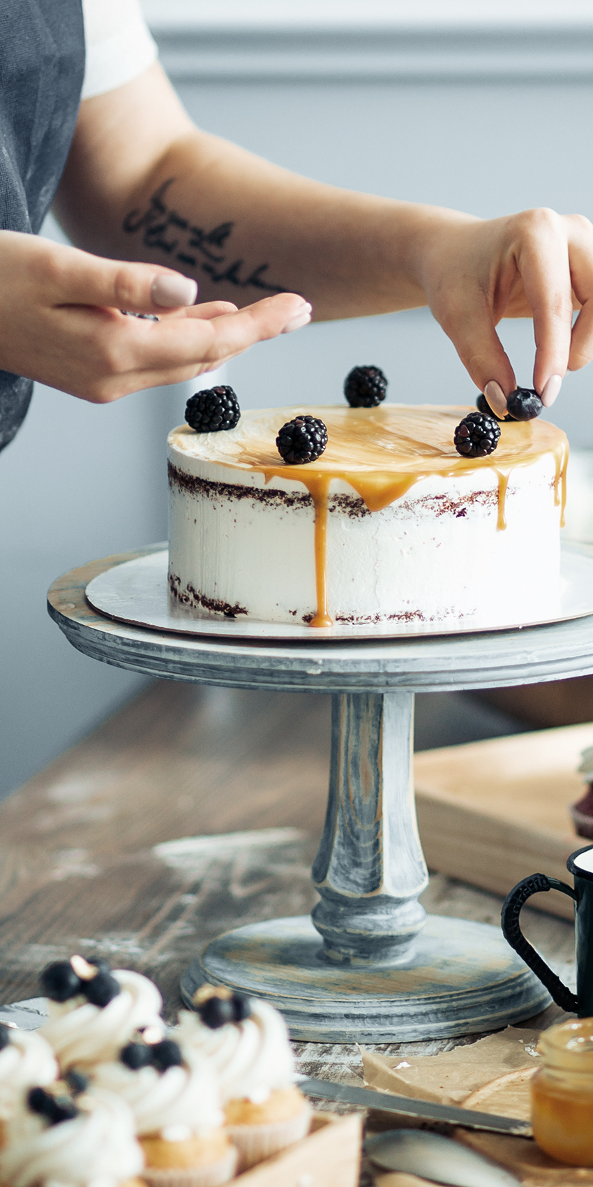 Baker decorating cake