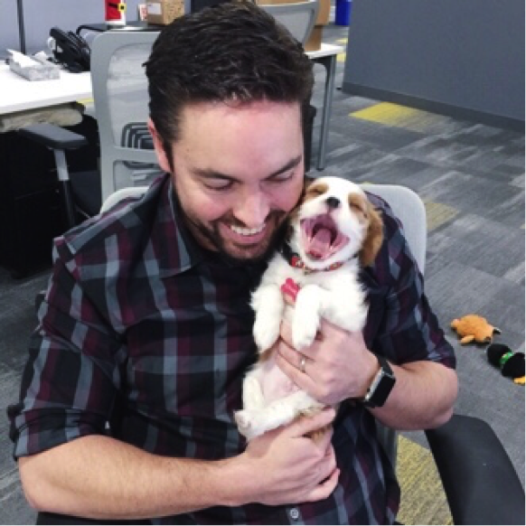 mike mothner holding puppy charlie mothner