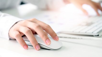 close up on woman hand clicking ppc