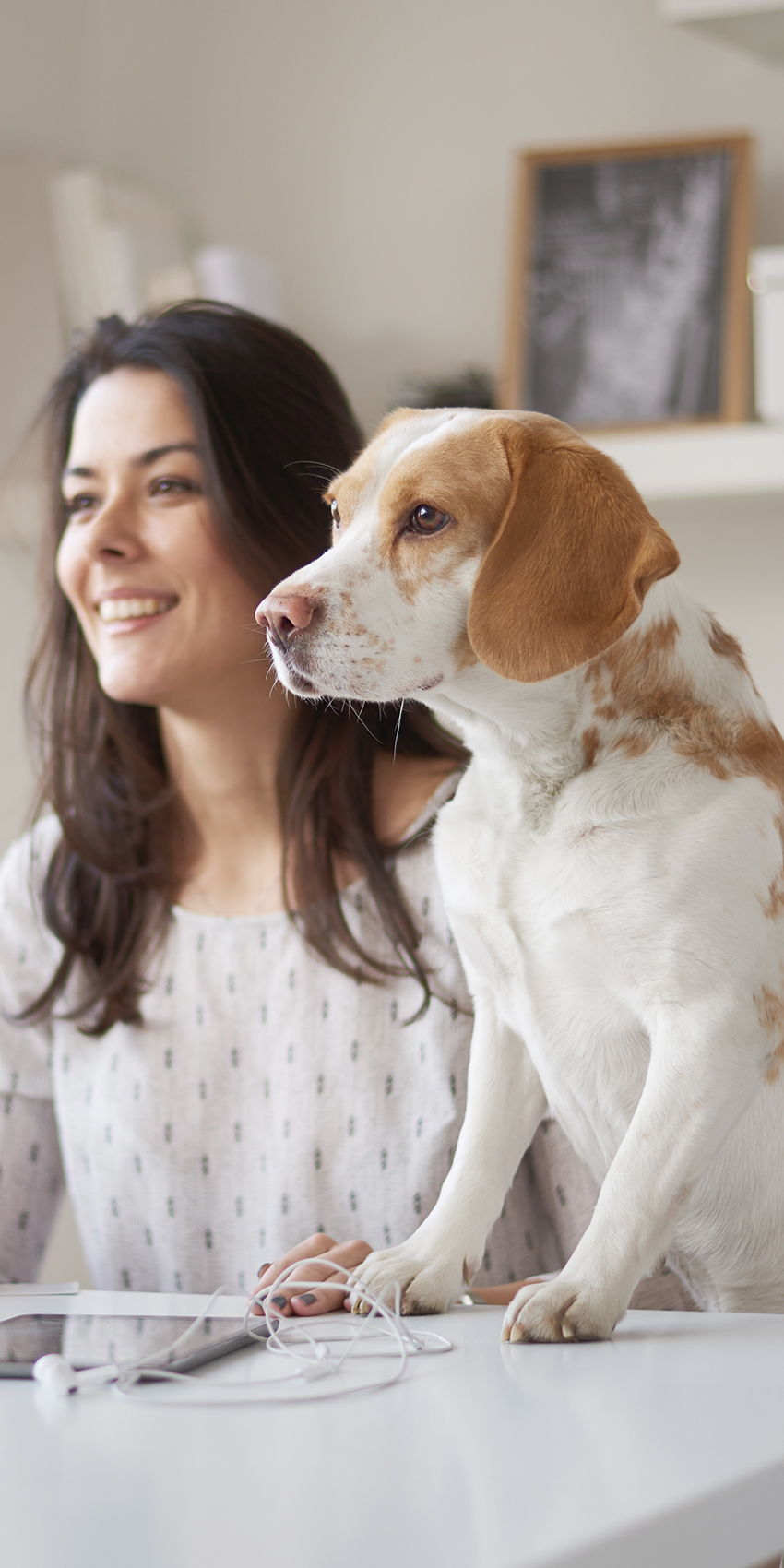woman and dog in home office