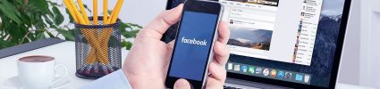 facebook marketing partner on phone and facebook platform on computer