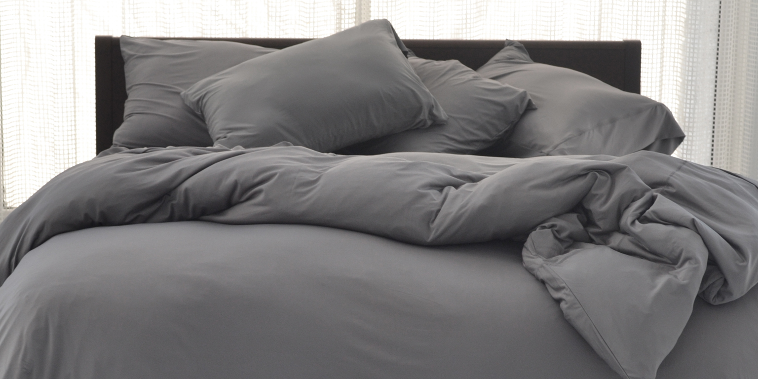 sheex grey sheets on bed
