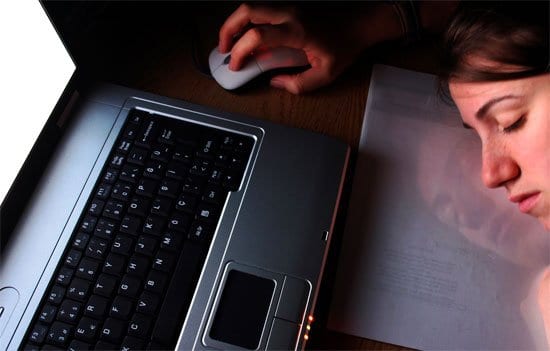 woman sleeping at laptop