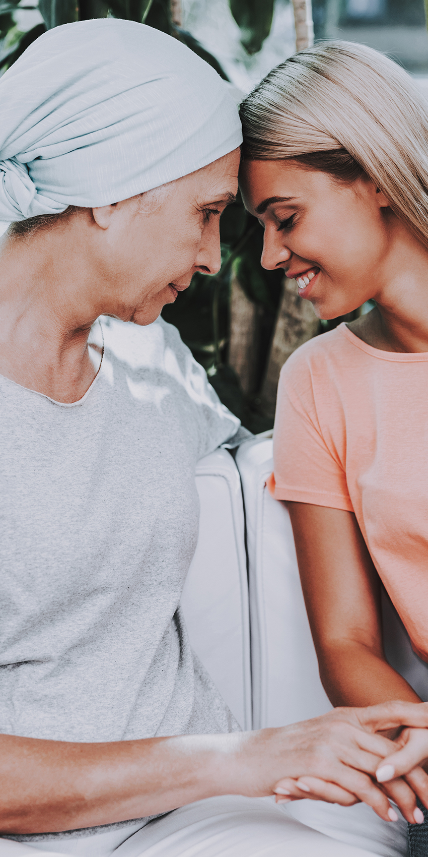 grandmother and granddaughter hugging