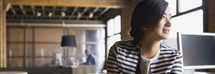 woman in coffee shop looking to the side