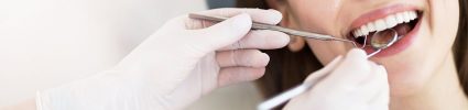 Dentist working on teeth
