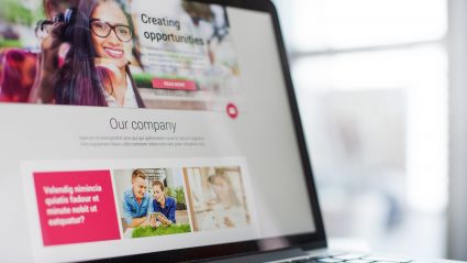 website landing page design on laptop screen