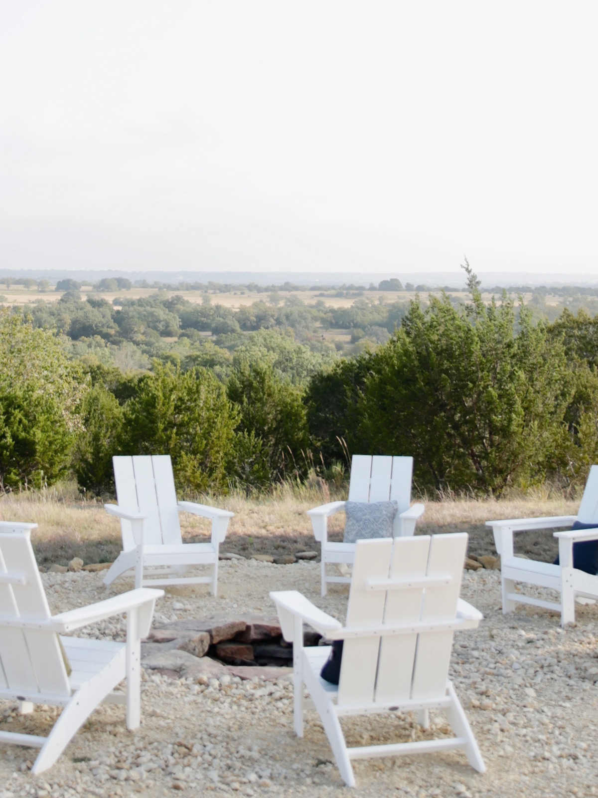 whiter polywood chairs in circle outdoors