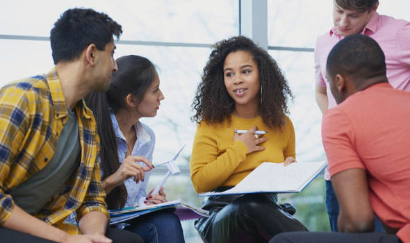 young people discussing in meeting