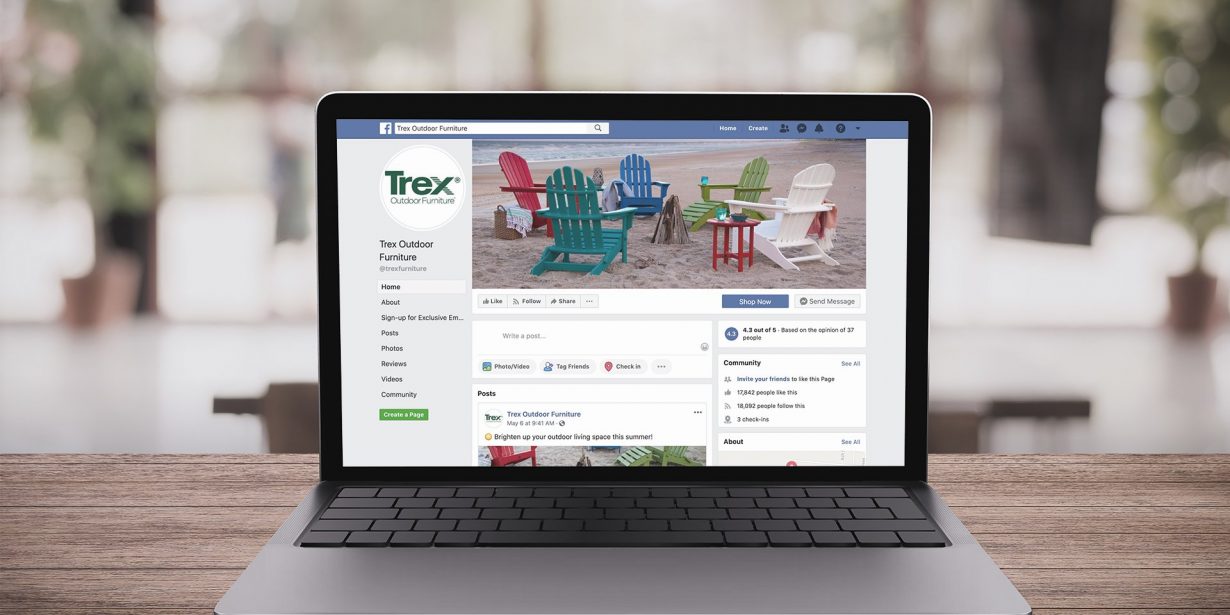 A laptop on a wooden table displays the Facebook page for Trex Outdoor Furniture, featuring colorful chairs on a beach as the cover photo.