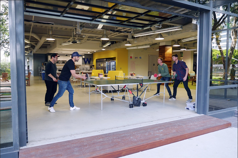 People playing ping pong at Wpromote.