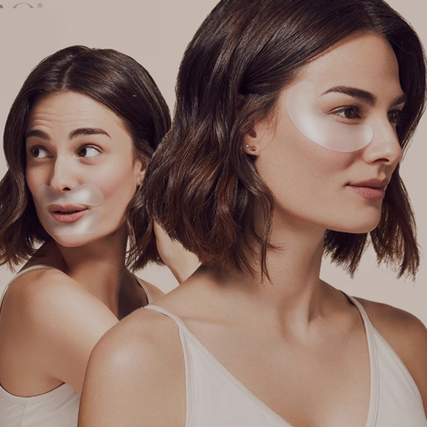 Woman using Sio Beauty product on face