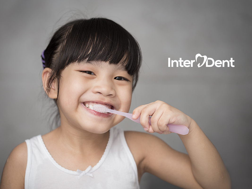 Girl brushing her teeth