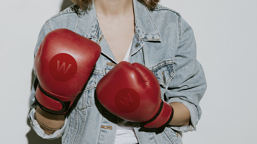 woman with wpromote boxing gloves