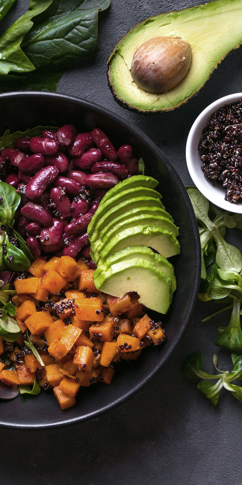 salad with avocado beans and veggies flat lay