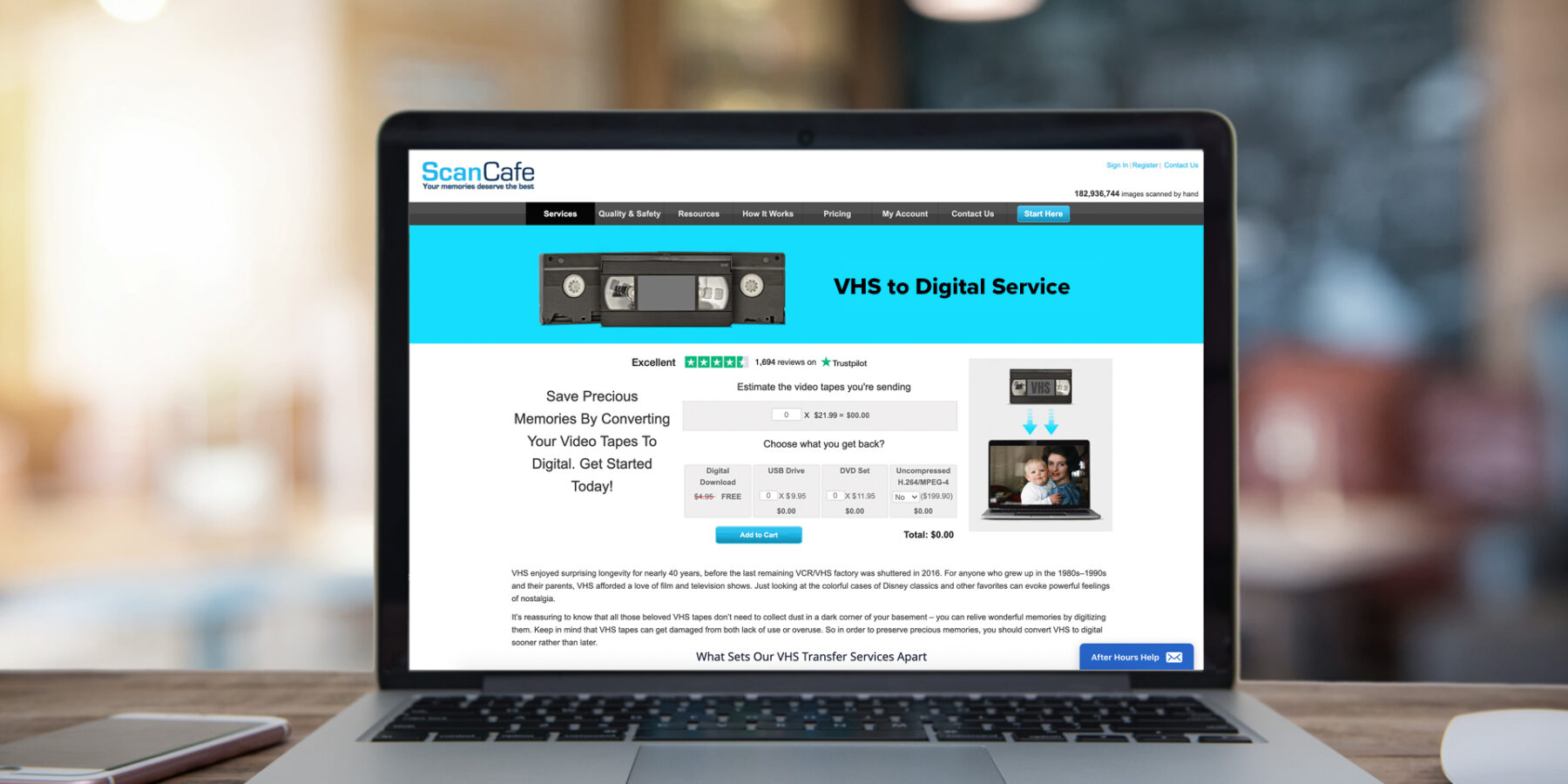 A laptop screen displays the ScanCafe website’s VHS to Digital service page, showing details about converting VHS tapes to digital format.