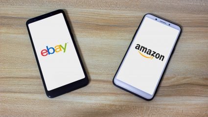 Two phones: one displaying eBay and one Amazon