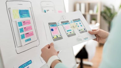 Person looking at mockup of UX on phone