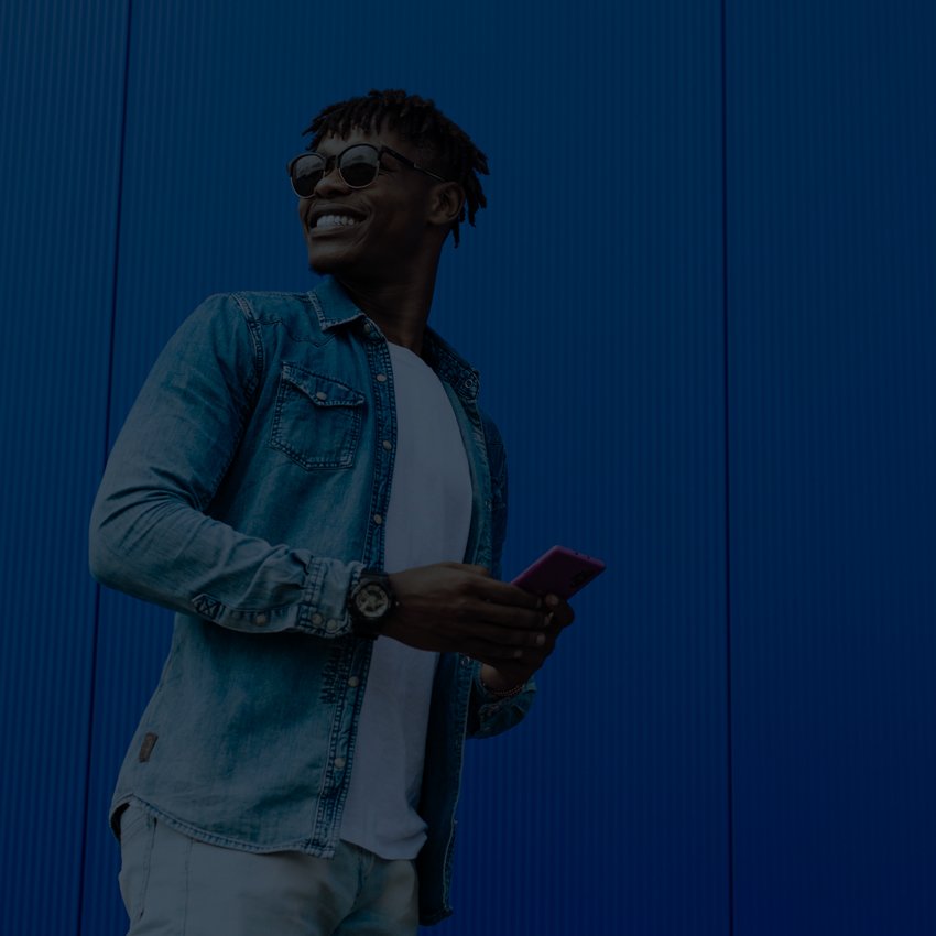 happy man holding phone