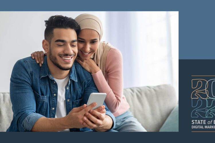 A man and woman sit on a couch, smiling and looking at a smartphone together. The image includes the text "2022 State of B2B Digital Marketing.