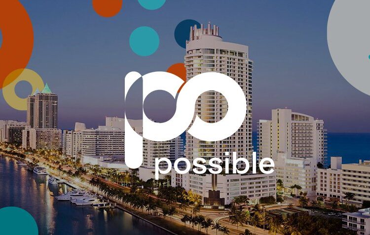 A cityscape with high-rise buildings along a waterfront at dusk, overlaid with the word "possible" and abstract colorful circles.