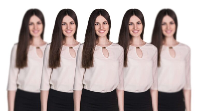 Five women with identical appearances stand in a row, with the central figure in sharp focus and others progressively blurred toward the edges.