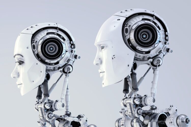 Two humanoid robots with exposed mechanical parts and circular components in their heads, facing opposite directions against a light gray background.