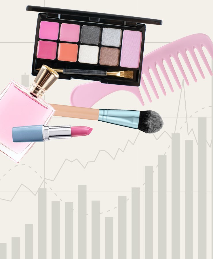 A makeup palette, pink comb, perfume bottle, lipstick, and brush are arranged over a background of bar and line graphs.