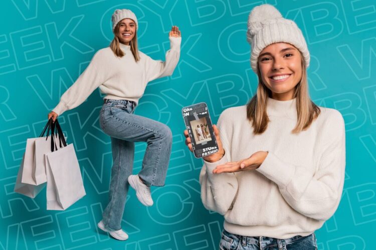 Two women in winter clothing stand on a blue "Cyber Week" background; one holds shopping bags, the other displays a smartphone showing a shopping app.