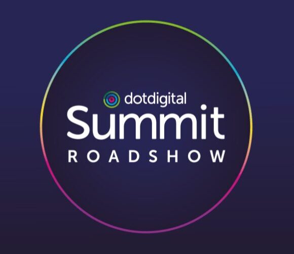 Dotdigital Summit Roadshow logo displayed in white text within a circle outlined by a rainbow gradient on a dark blue background.