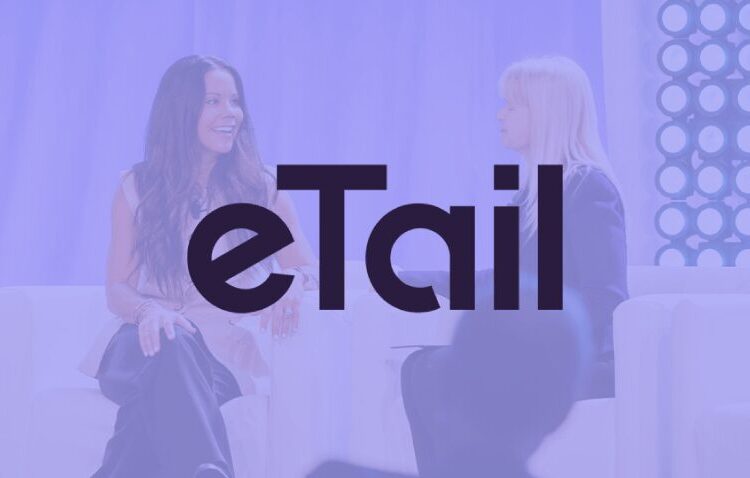 Two women sit and talk on stage with the word "eTail" boldly displayed over the image.