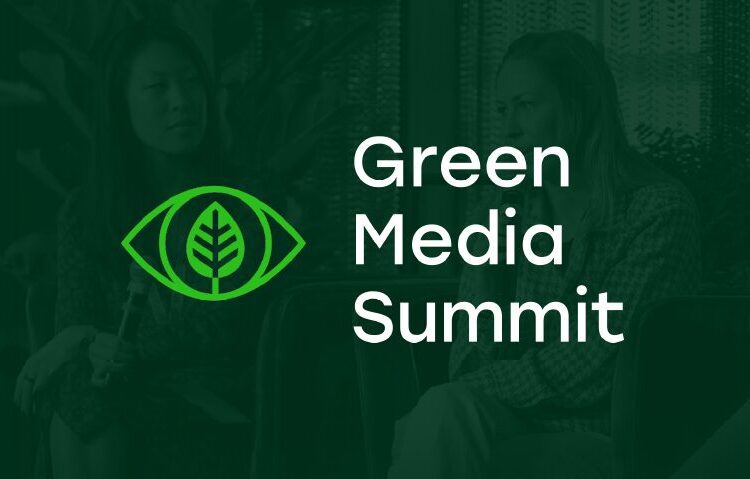 Two people sit and talk on stage next to a graphic of an eye with a leaf inside and the text "Green Media Summit.