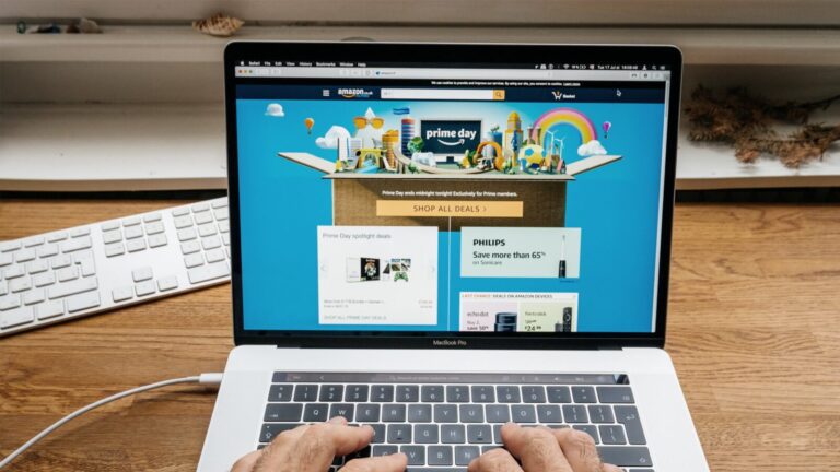 A person typing on a laptop.