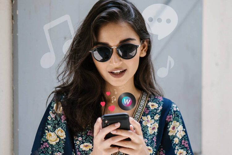 A woman wearing sunglasses and a floral top looks at her phone, with digital music, chat, and heart icons superimposed around her.