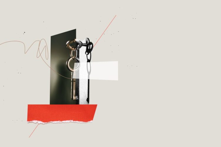 A metallic key on a ring hangs from a hook against an abstract background with geometric shapes and scribbles.