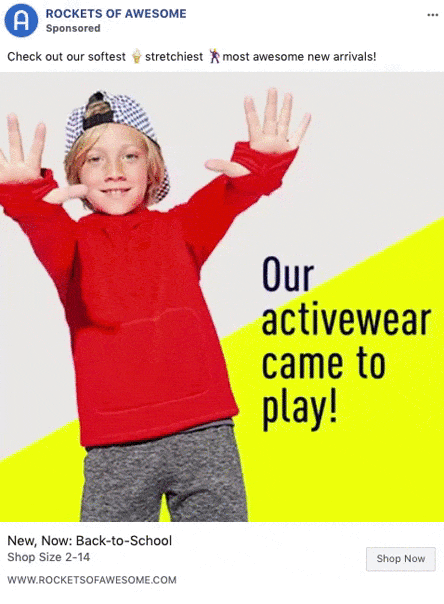 A young child wearing a red sweatshirt and gray pants stands with hands up in front of a yellow and white background with the text "Our activewear came to play!.